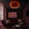 room with a microphone and seating 