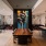 room with ample seating and a painting on the wall 