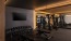a room with weights and exercise equipment 
