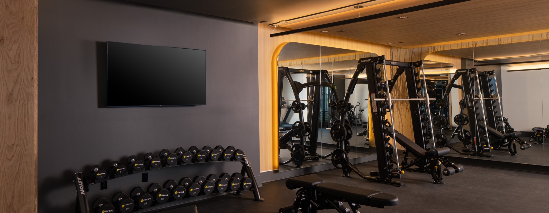 a room with weights and exercise equipment 