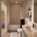 bathroom with sink and shower tub with backlit mirror 