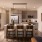 a kitchen with white counters and seating