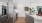 a kitchen with black cabinets